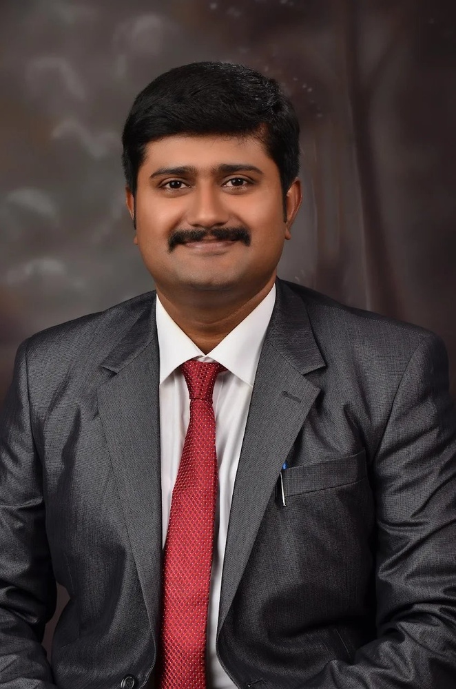 Dr. P. Mohan Kumar